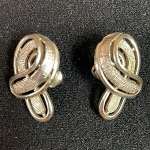 Vintage Silvertone Clipon Ribbon Like Twist Earrings 1” Long